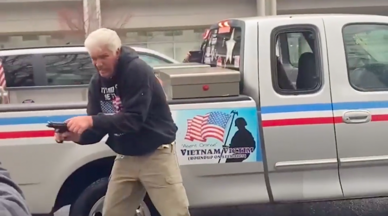 Maced Right-Wing Demonstrator Points Gun at Protesters in
Oregon 'Freedom Rally' Clash 1