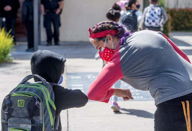 COVID: Newsom touts school reopening, but few hours are
spent in class 1