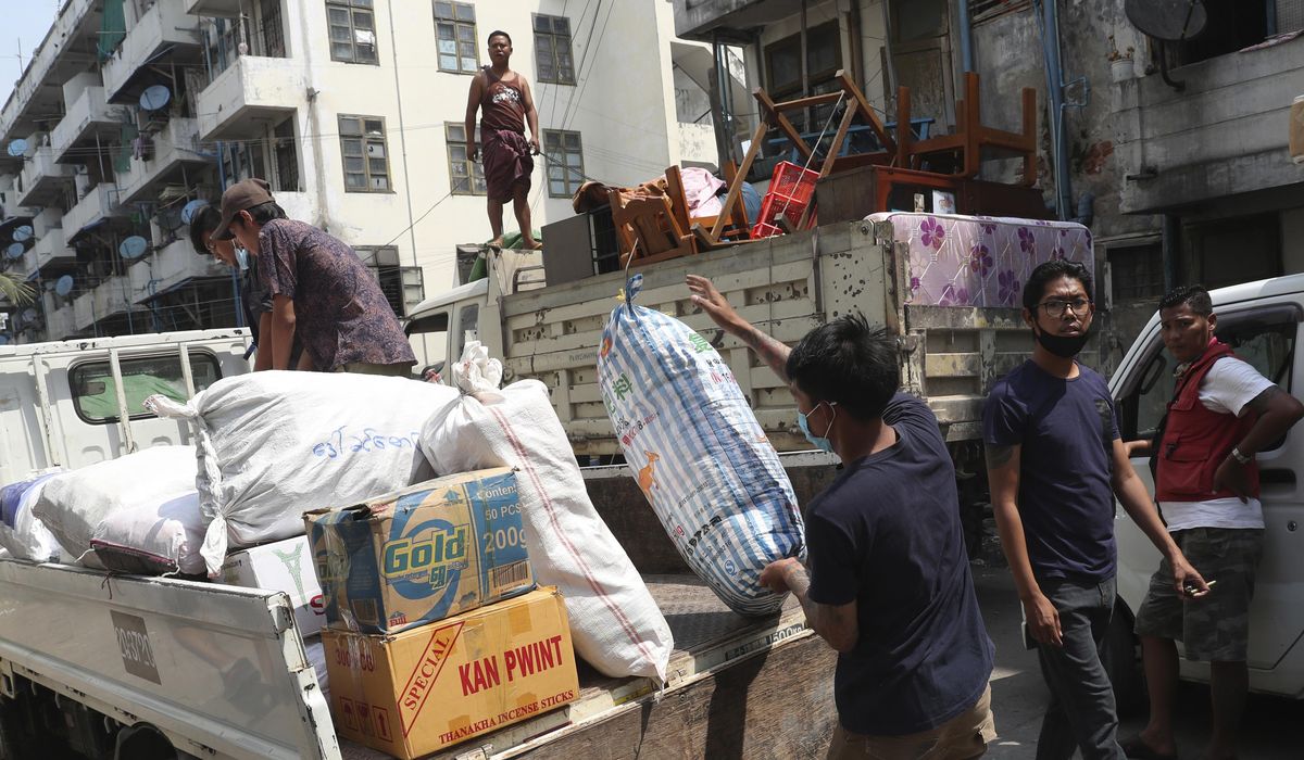 Striking Myanmar rail workers move out as protests
continue 1