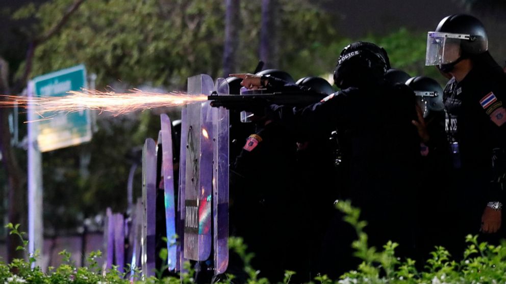Thai police use tear gas, rubber bullets to break up
protest 1