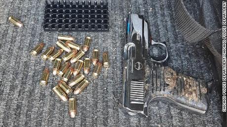Man charged with attempted murder after police officers were
shot at in Chicago 1