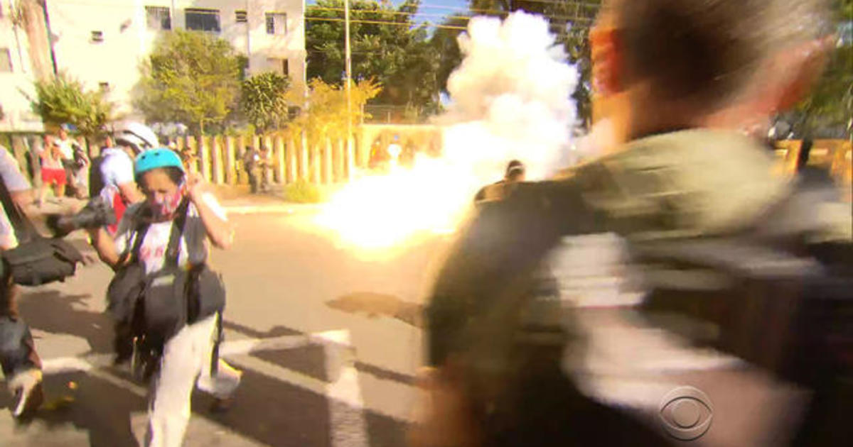 Brazilian police and protesters clash as World Cup
begins 1