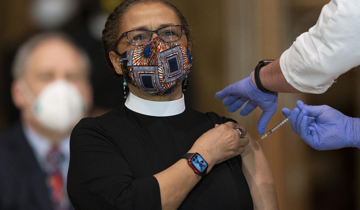 Faith leaders get COVID-19 shot to curb vaccine
reluctance 1