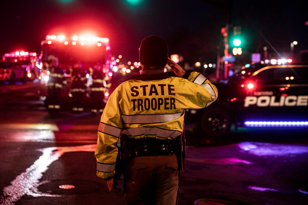 Police line streets in procession for slain Boulder officer
Eric Talley 1