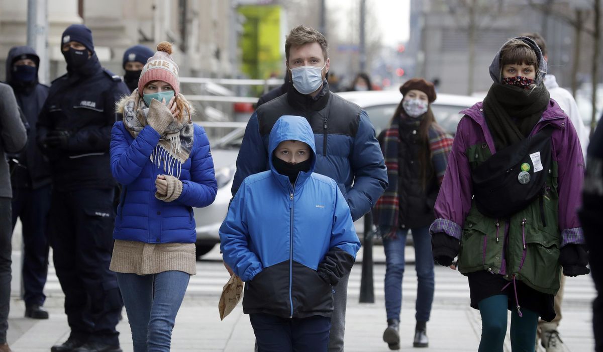 Poland records new record virus high as hard lockdown
looms 1
