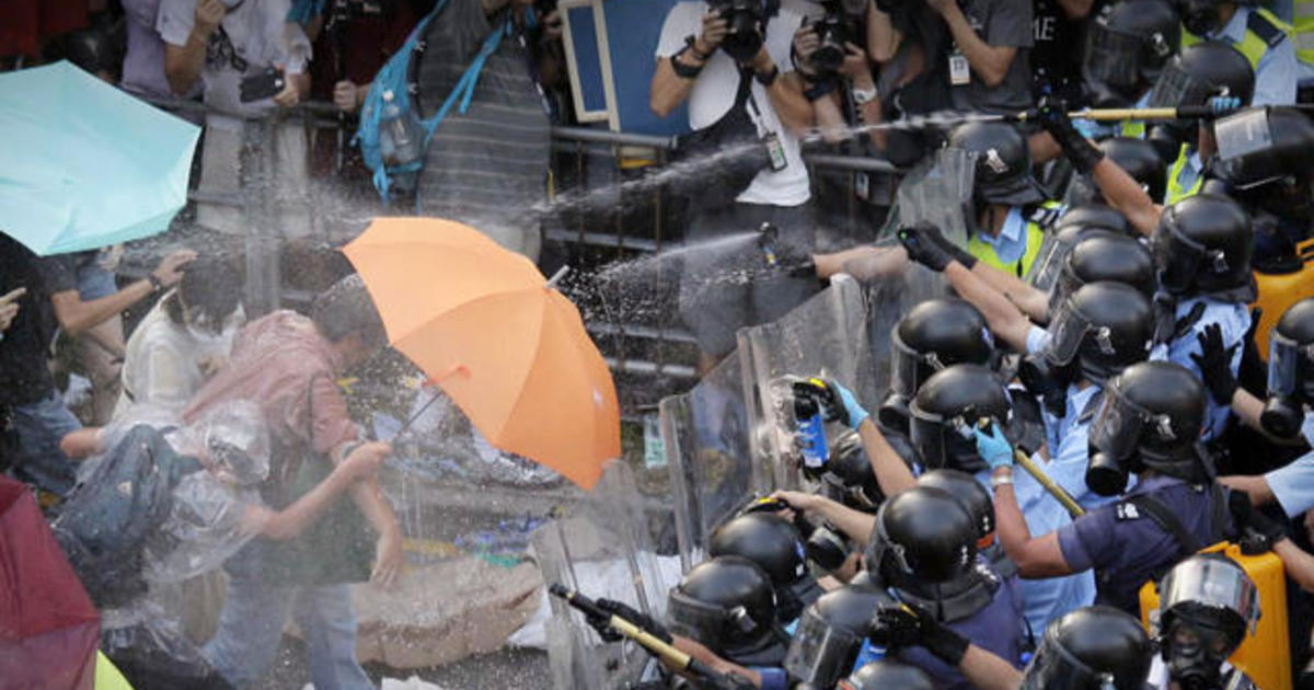 Pro-democracy protestors in Hong Kong defy calls to
disperse 1