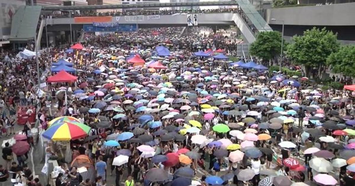 Protesters boo during Communist China founding
ceremony 1 Protesters boo during Communist China founding
ceremony 1