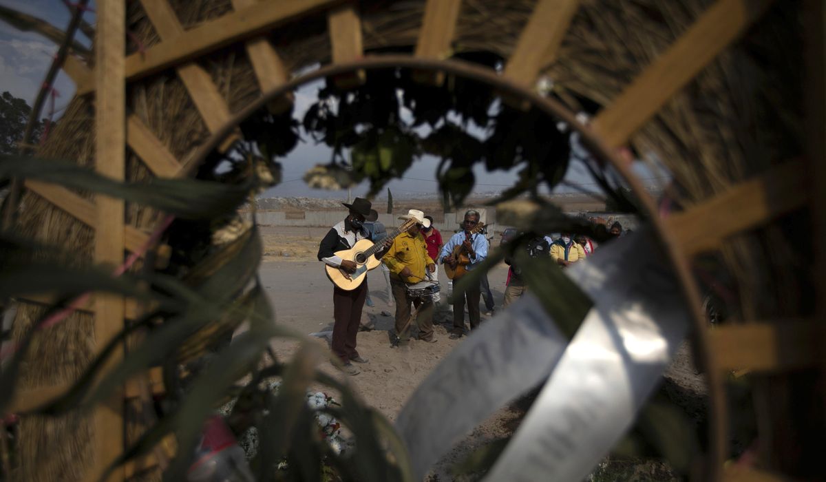 Mexico tops 200,000 COVID-19 deaths, but real toll is
higher 1