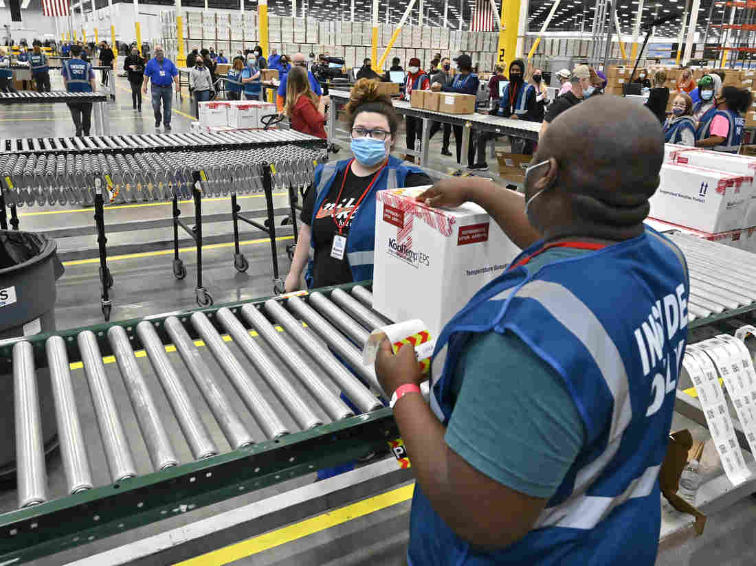 Johnson & Johnson Vaccine Rollout Begins In U.S. As
COVID-19 Cases Tick Up 1