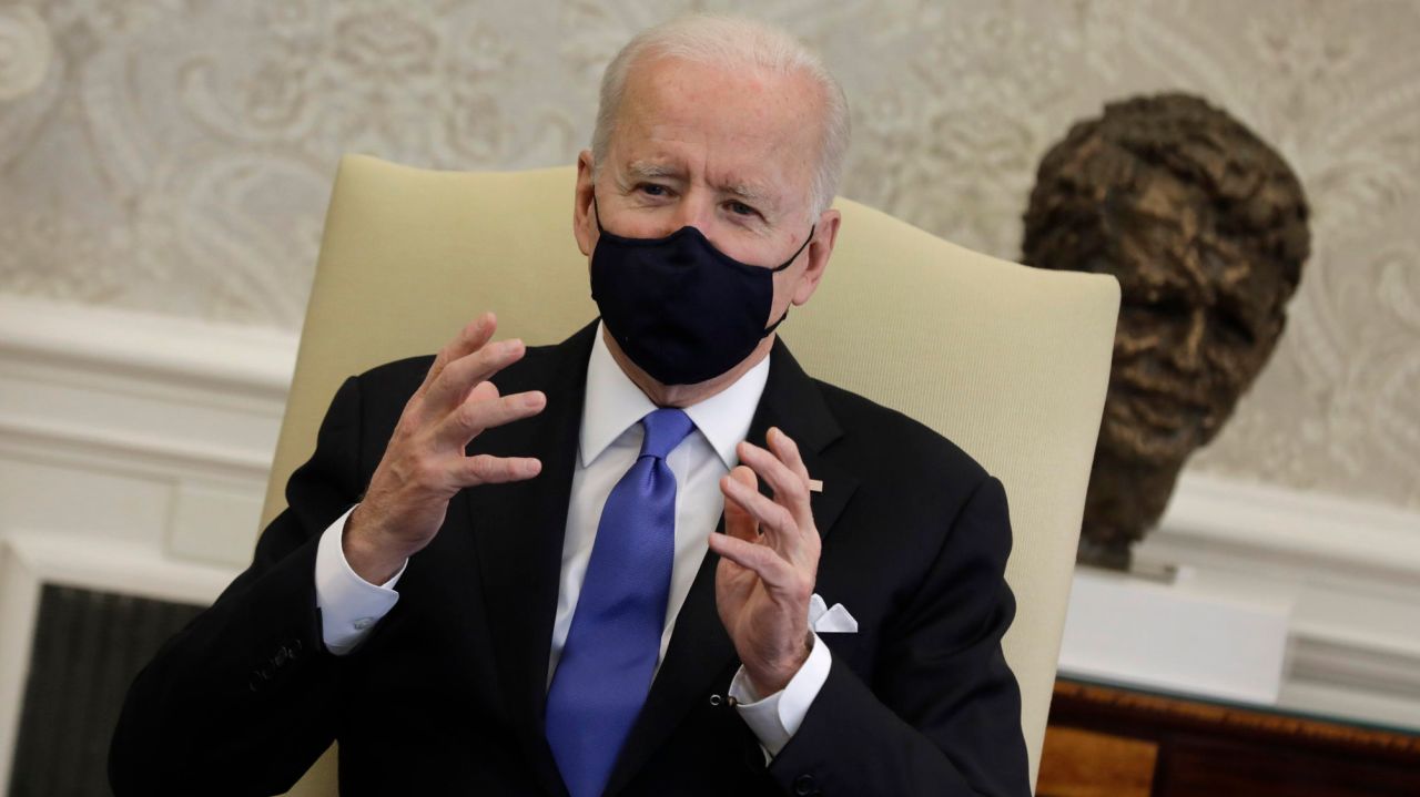 Mask war flares; Biden rips 'Neanderthal thinking' 1