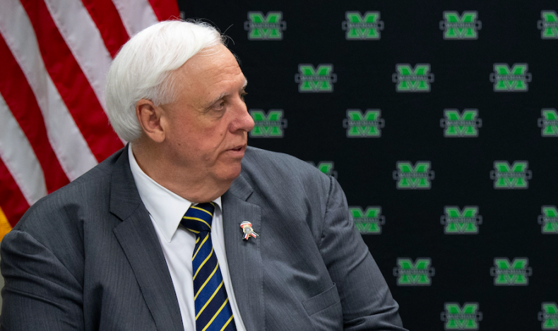 GOP West Virginia Governor Suggests Abbott Trying to Do
'Macho Thing' by Lifting Mask Mandates 1