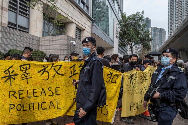 Hundreds in Rare Hong Kong Protest as Opposition Figures Are
Charged 1