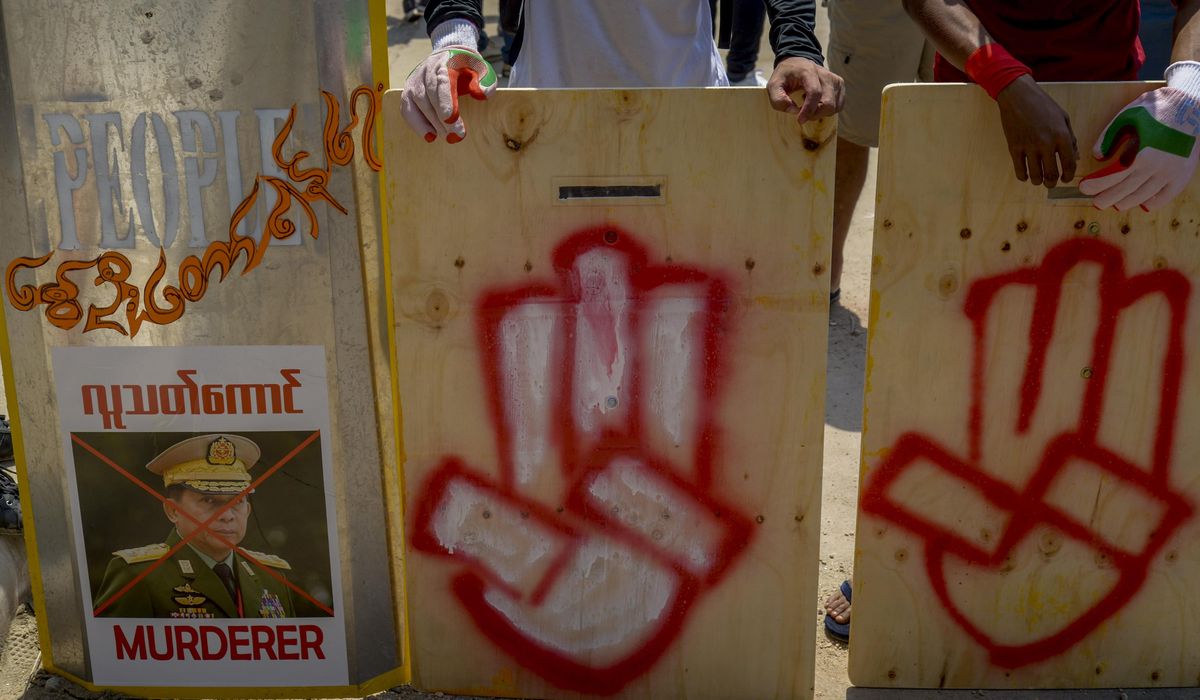 Myanmar protesters venture out despite police
violence 1