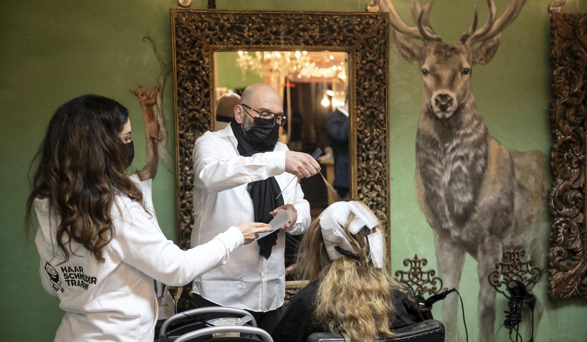 The Latest: German hair salons reopen as virus rules
eased 1