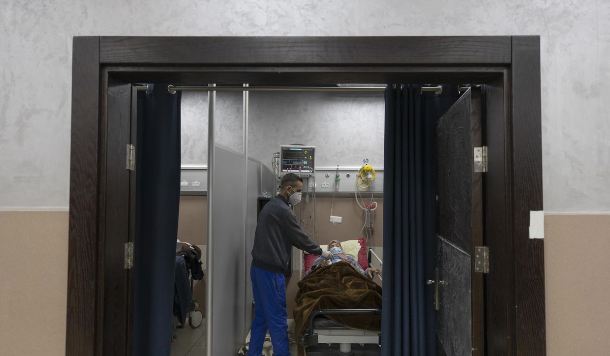 A year in, coronavirus rages in vaccine-needy West
Bank 1