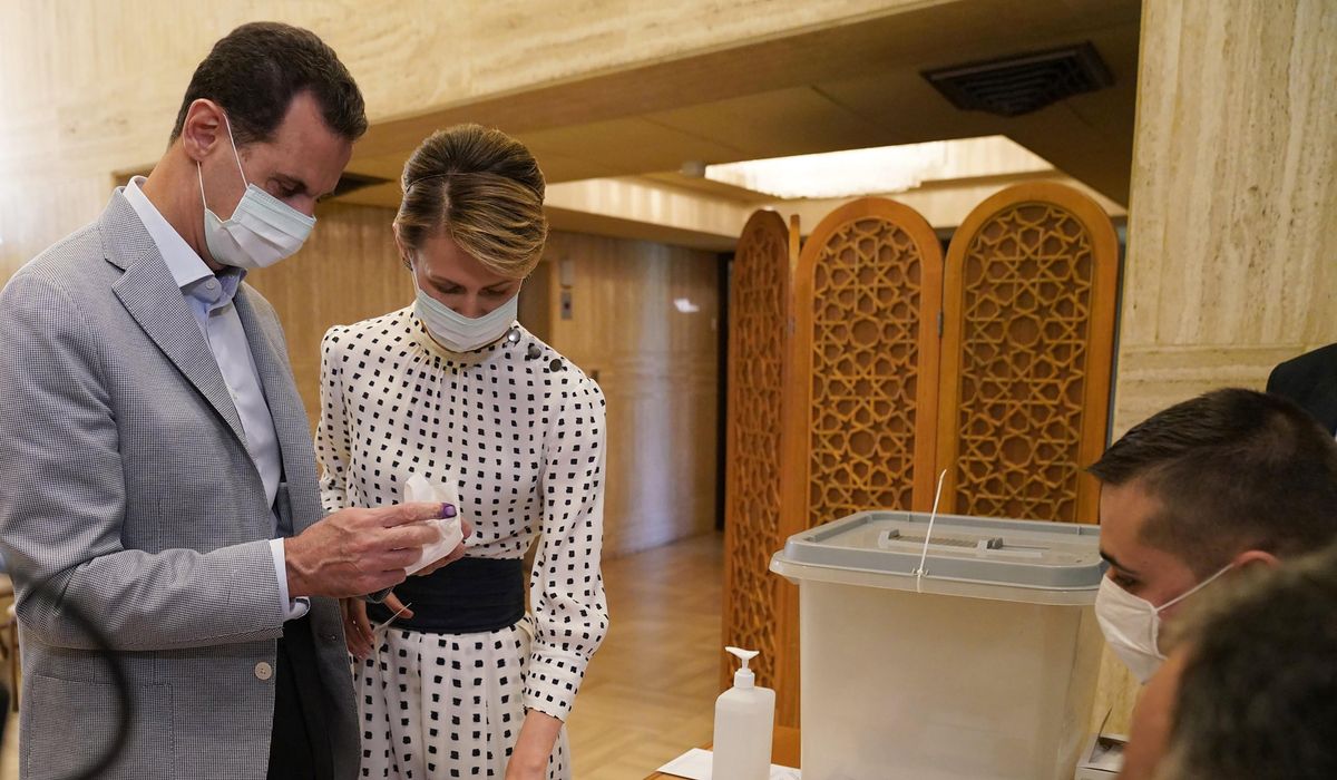 Syria says Assad, his wife have recovered from
coronavirus 1