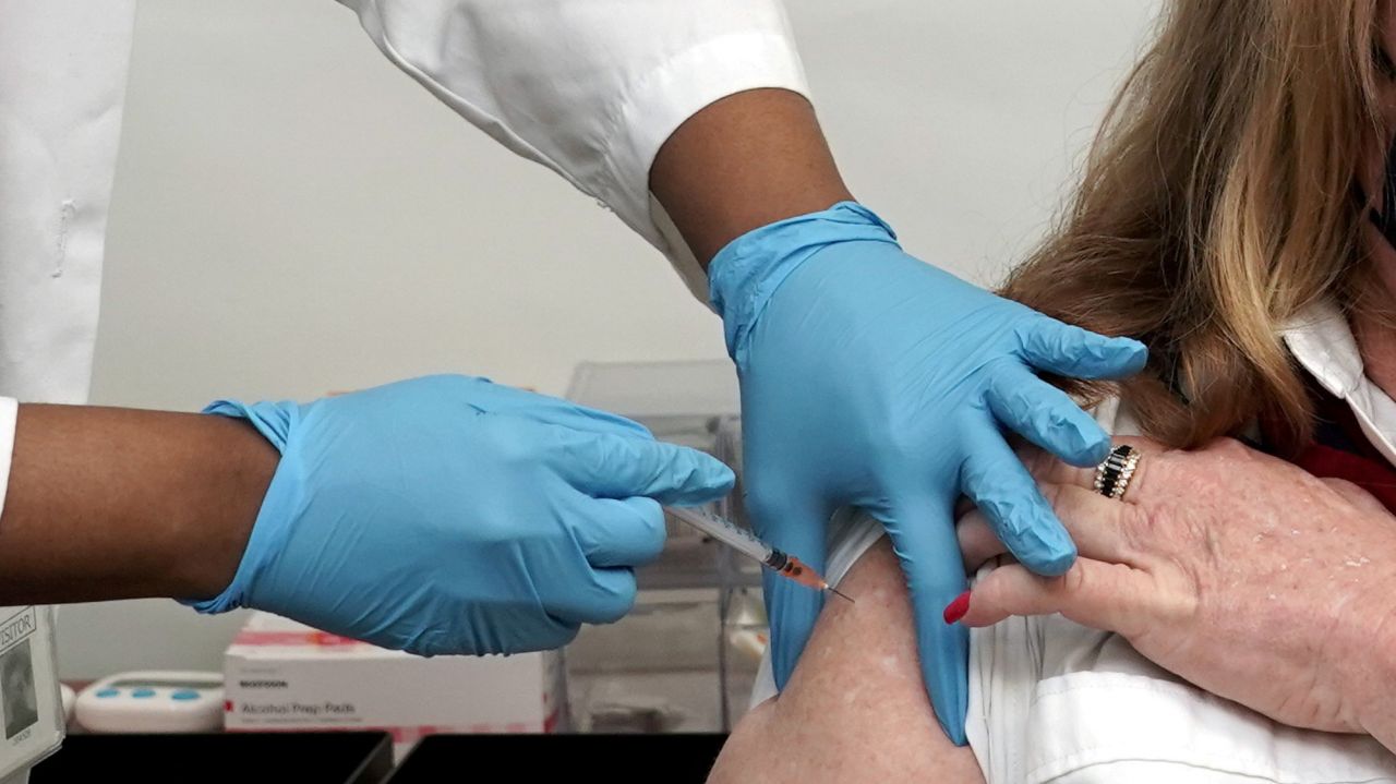 Record 1.4M COVID-19 vaccine doses given in state,
governor says 1