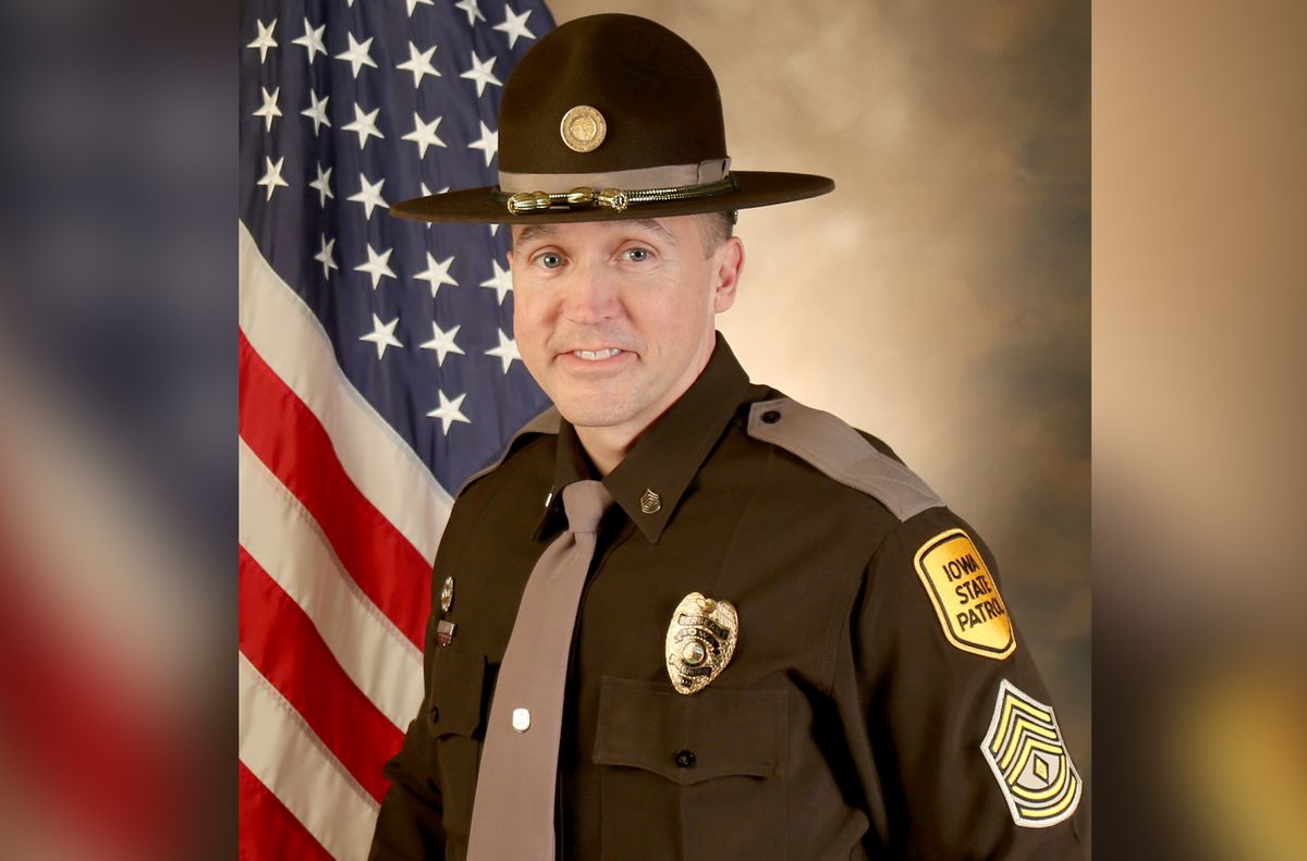 Iowa State Patrol trooper fatally shot by suspect wanted for
assault on another officer 1
