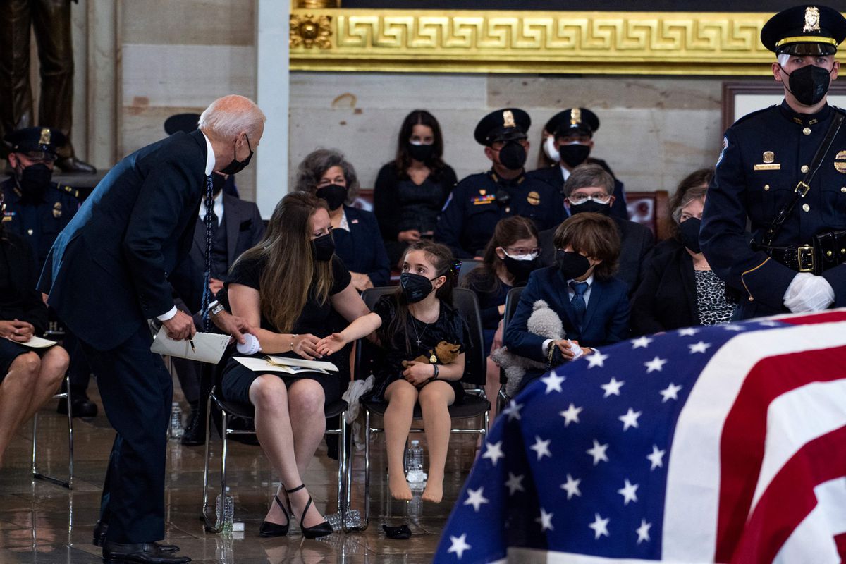 ‘Your dad was a hero’: Biden consoles family of slain
Officer William Evans at Capitol Rotunda memorial 1 ‘Your dad was a hero’: Biden consoles family of slain
Officer William Evans at Capitol Rotunda memorial 1