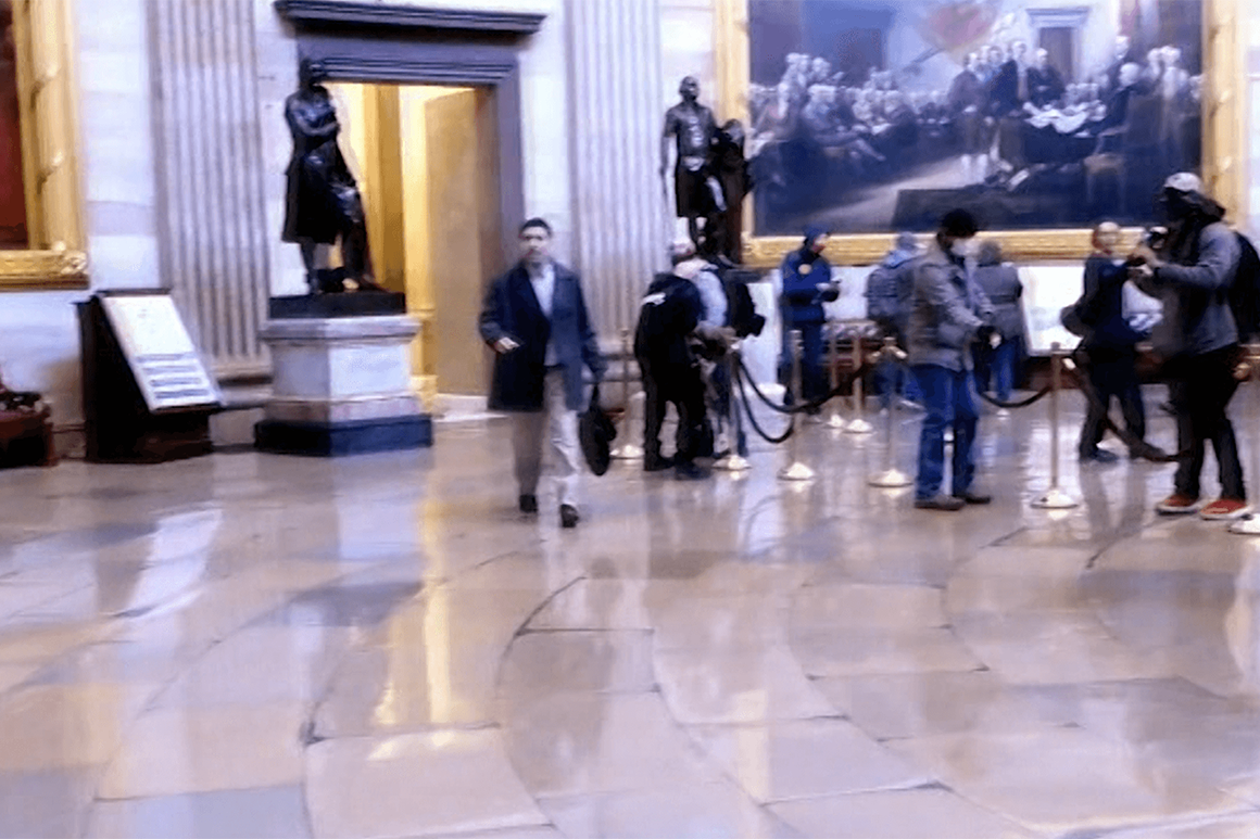 This Trump backer defended the Jan. 6 riot in print —
without mentioning he was in the Capitol 1