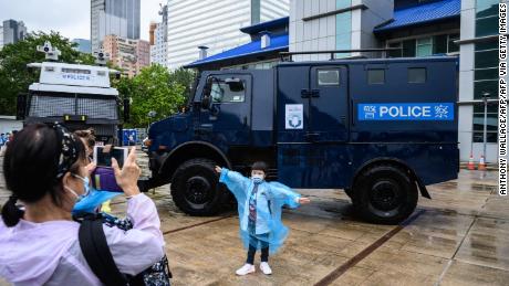 Hong Kong marks National Security Education Day with
goose-stepping police and riot cop souvenirs 1