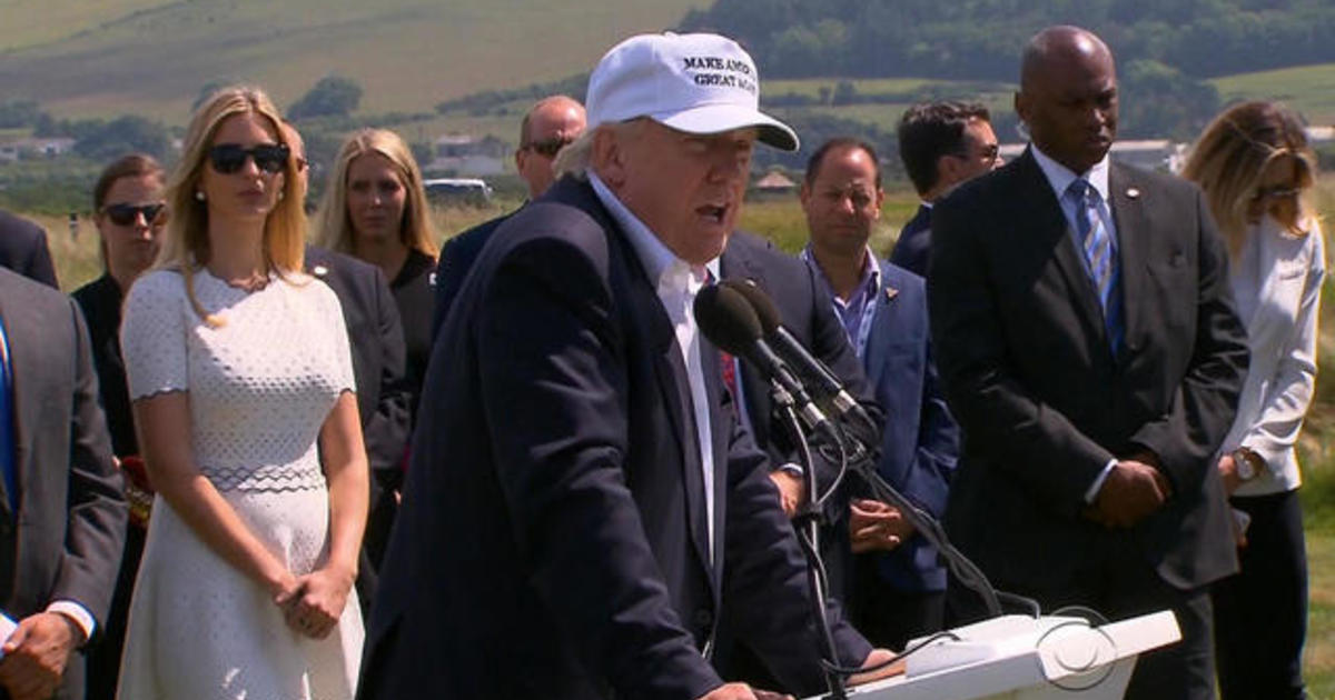 Protester greets Donald Trump at Scottish golf
course 1
