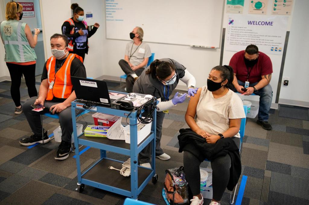 A jab on the job: Companies, unions offer COVID-19
vaccines 1