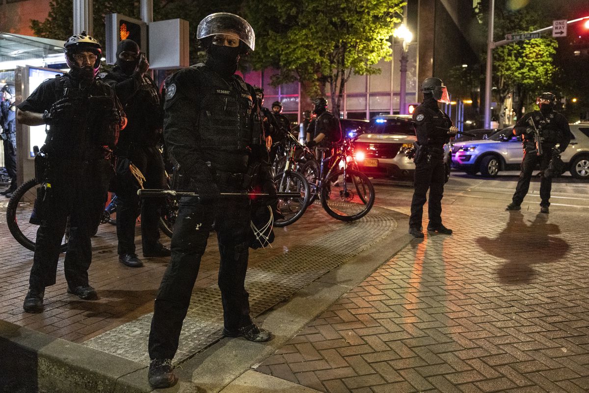 At least two arrested during Portland protests after Derek
Chauvin conviction, police officers use pepper spray 1