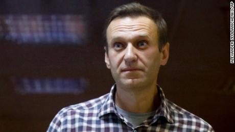Putin urges all citizens to be vaccinated against Covid-19
as Navalny supporters rally 1