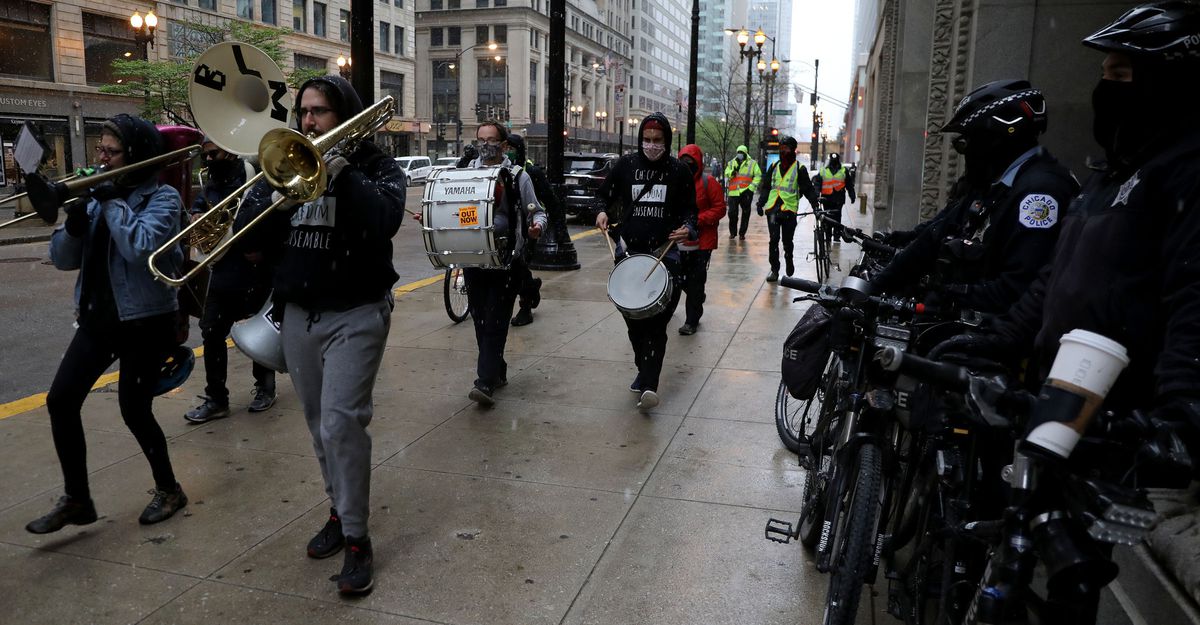 Protesters blast instruments, circle City Hall in push for
civilian police oversight referendum 1 Protesters blast instruments, circle City Hall in push for
civilian police oversight referendum 1