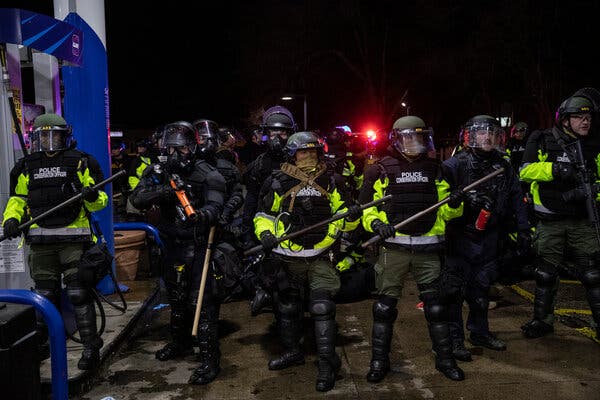 Justice Dept. Opens Broad Inquiry Into Minneapolis
Police 1