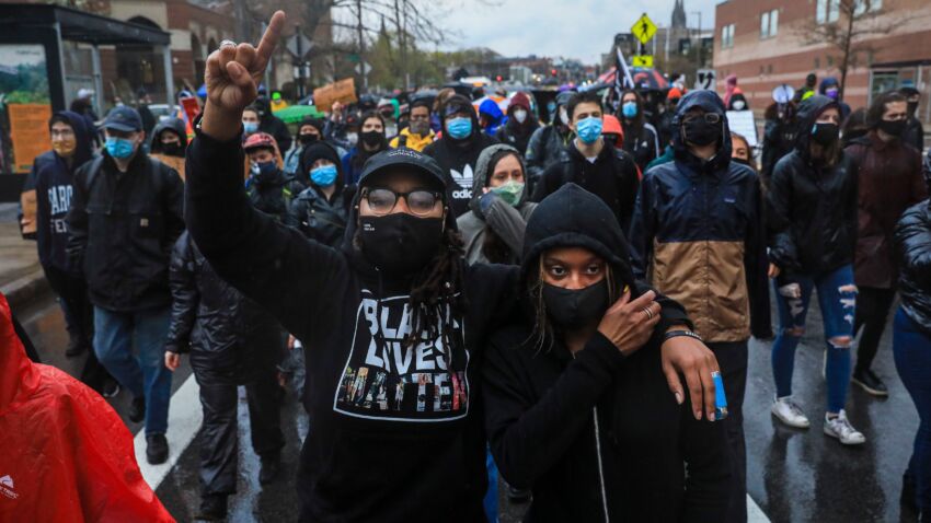 Emboldened by Chauvin verdict, protesters march against
police brutality in Boston 1