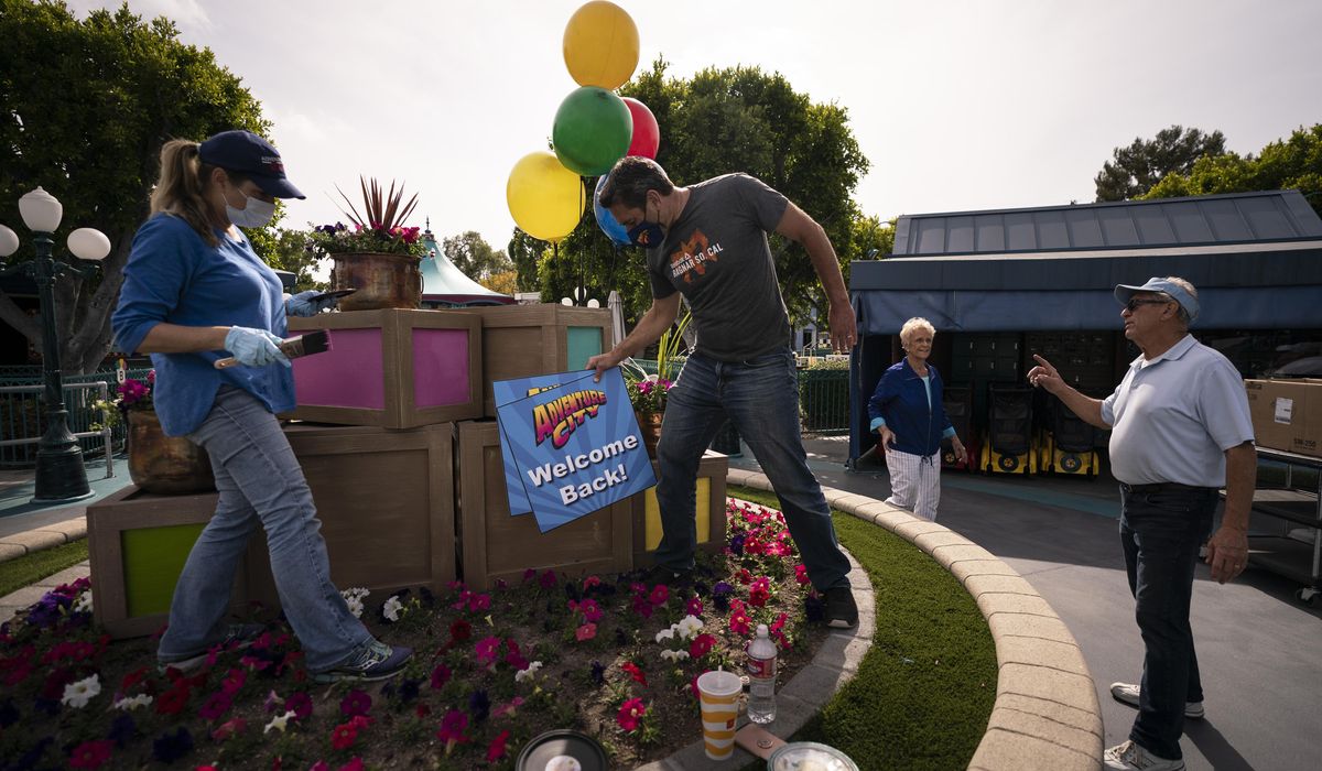 AP PHOTOS: California theme park reopens after virus
closure 1
