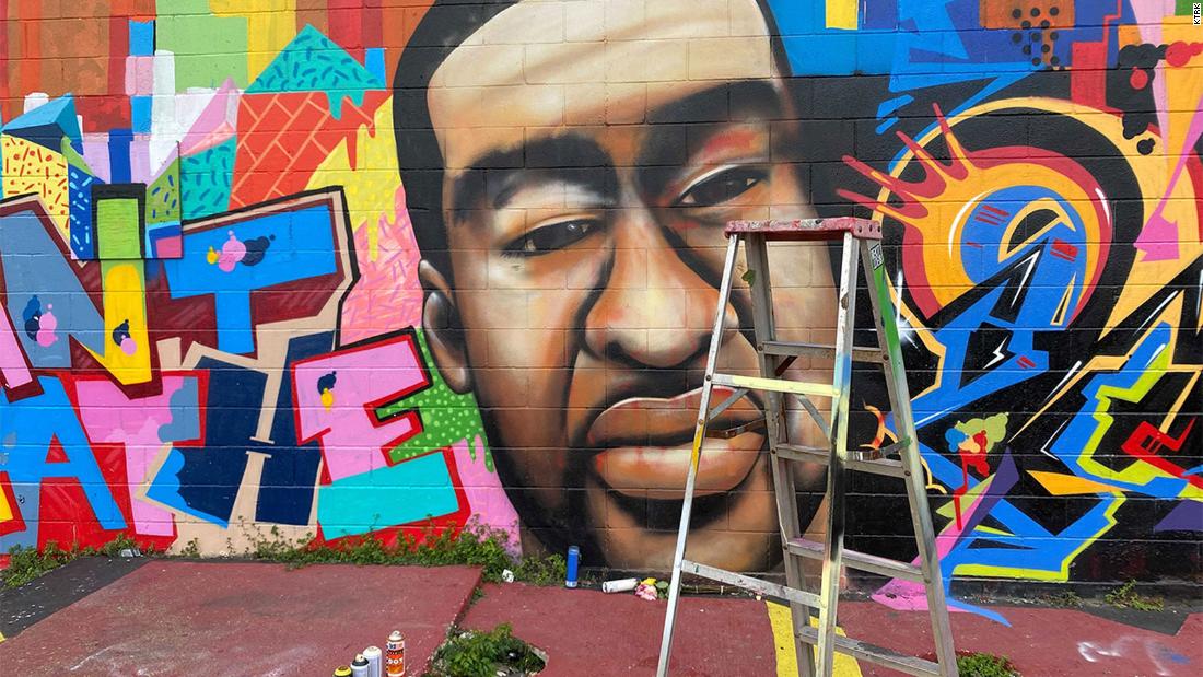 George Floyd mural in Houston defaced with a racial
epithet 1