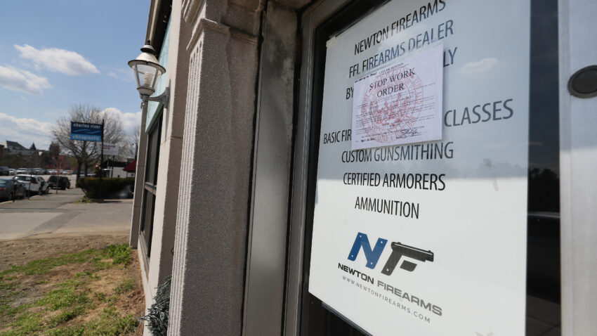 A gun shop is trying to open in Newton. City officials are
working to stop it. 1