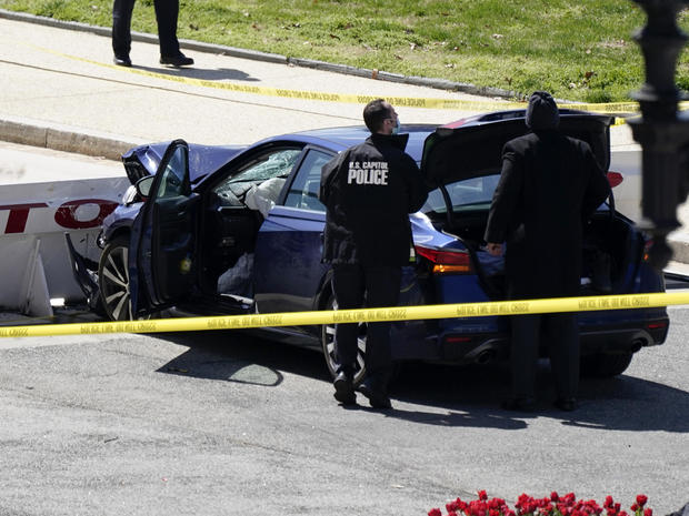 Police officer dies after suspect rams car into Capitol
barricade 1