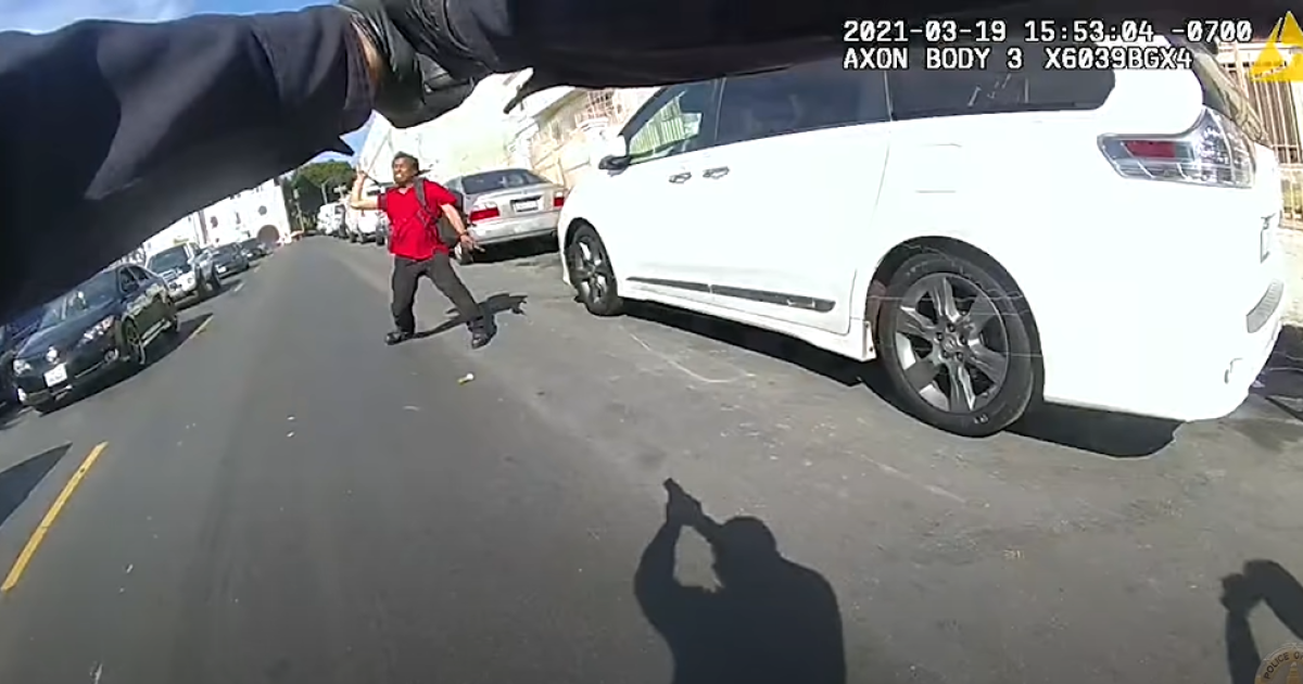 LAPD officer killed a man who had thrown a hammer, video
shows 1
