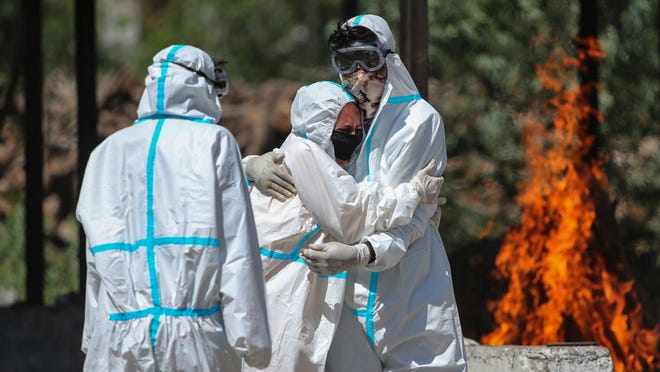 US passed 1M cases one year ago today; firefighting plane
may be sold to help fight pandemic; Chicago considers 'Vax Pass':
COVID-19 updates 1