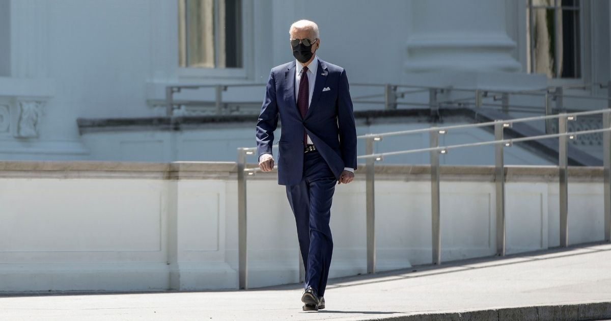 Watch: Biden Defies Science, Breaks with CDC Guidelines by
Walking Outside with Mask On 1