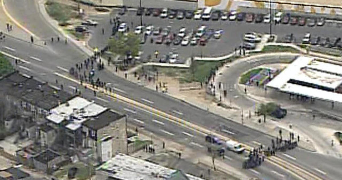 Protesters and police clash in Baltimore 1