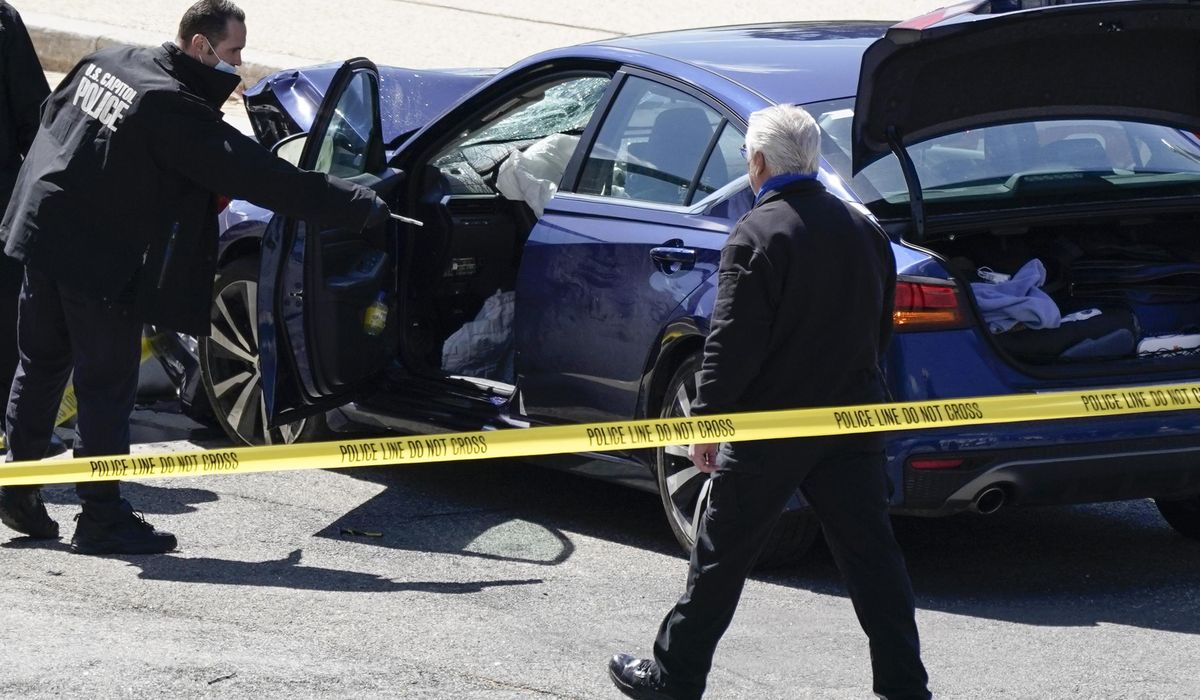 Man rams car into 2 Capitol police; 1 officer, driver
killed 1