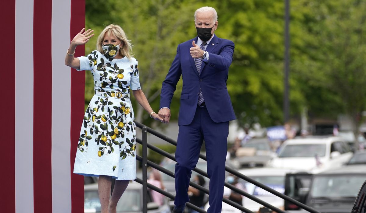 President Biden's 100-day rally interrupted by 'End
Detention Now' protesters 1