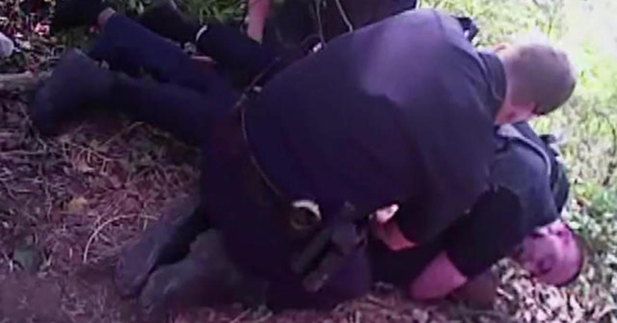 Bodycam shows officer hold gun to unarmed man's head 1