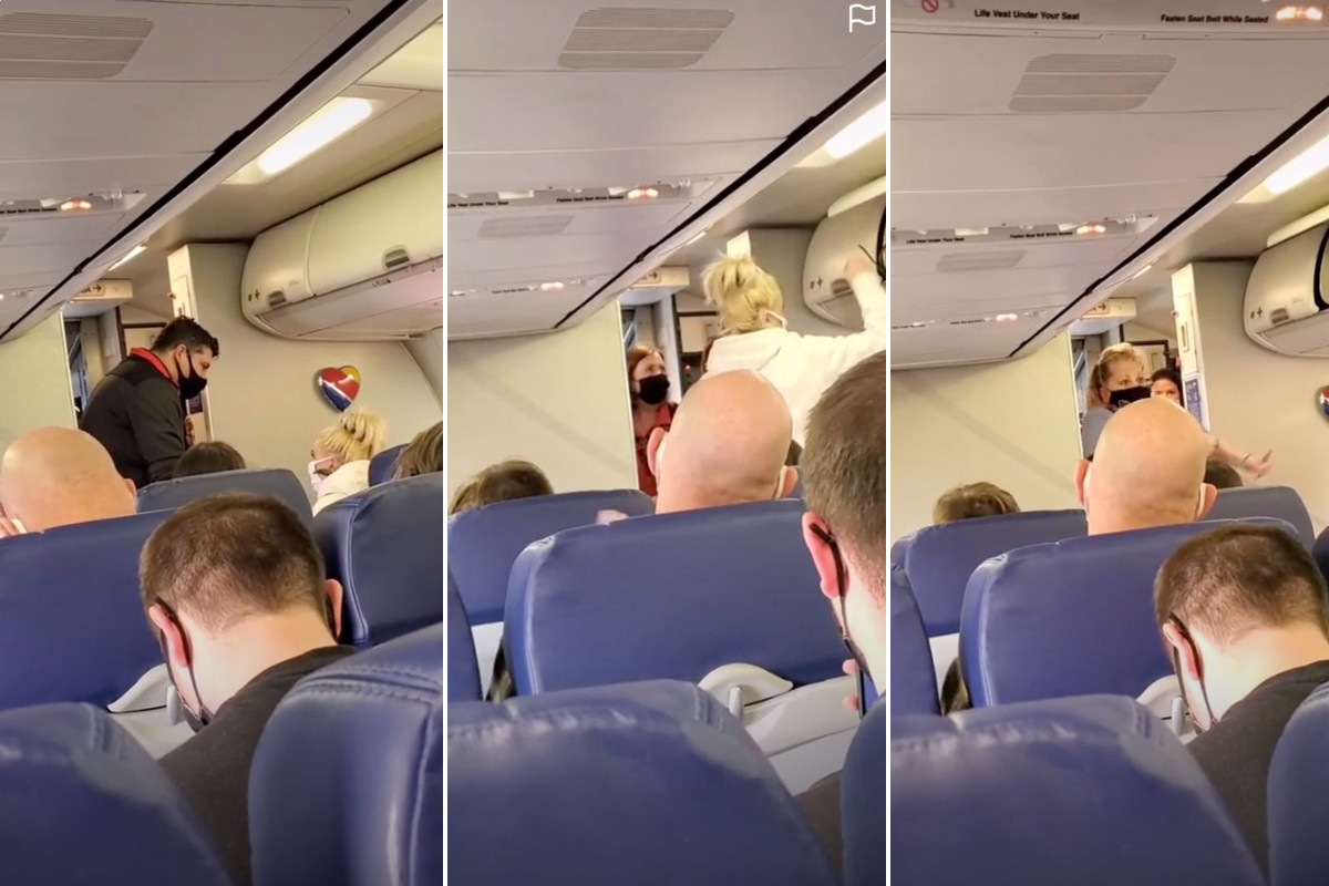 Southwest Airline passengers applaud when woman is kicked
off after mask dispute 1