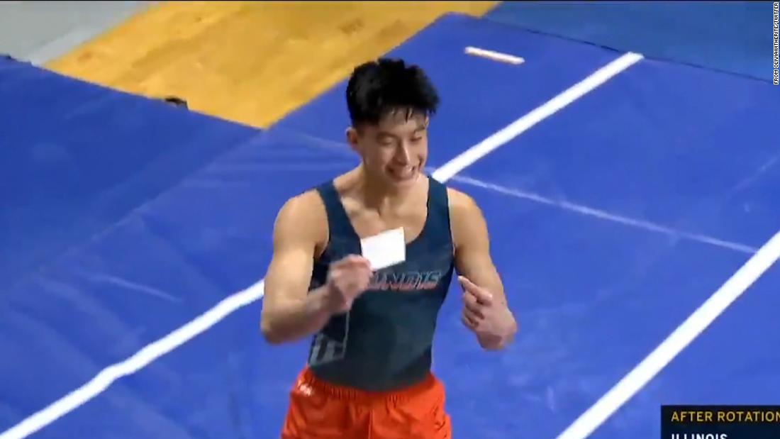 Illinois gymnast shows off Covid-19 vaccination card after
sticking the landing 1