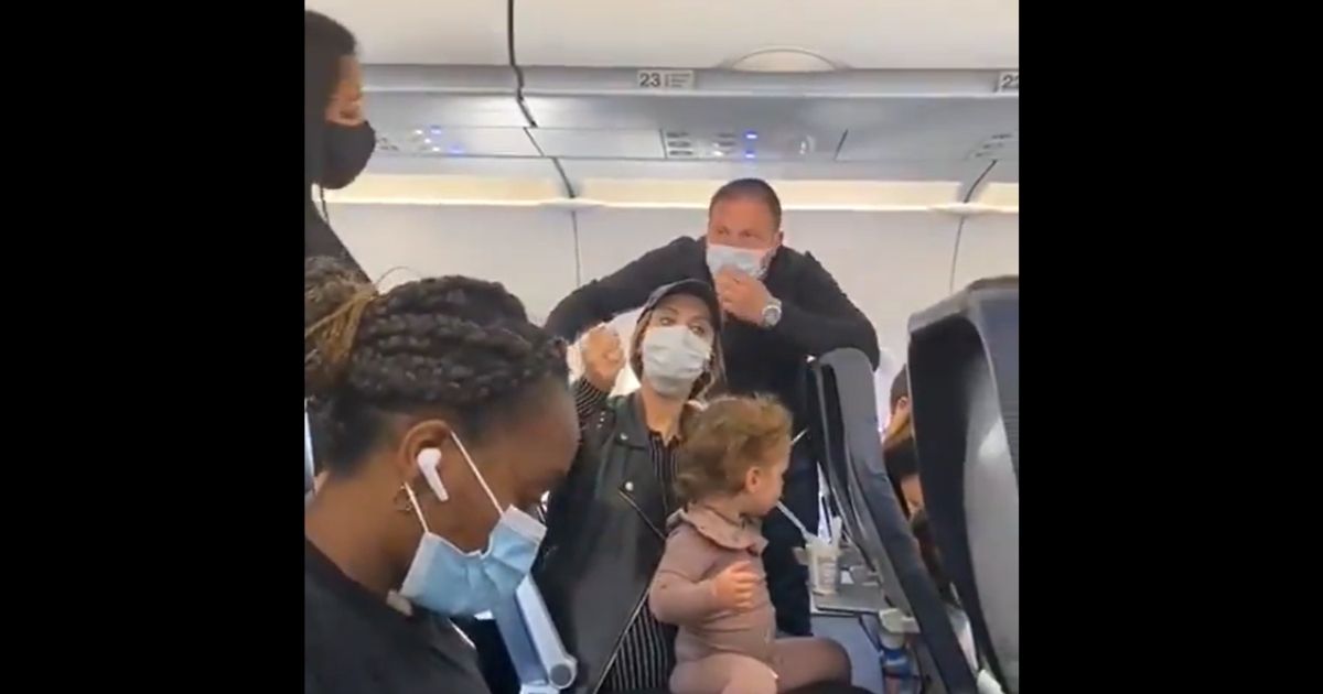 Watch: Family Told to Leave Flight Because 2-Year-Old
Daughter Wasn’t Wearing Mask While Eating 1