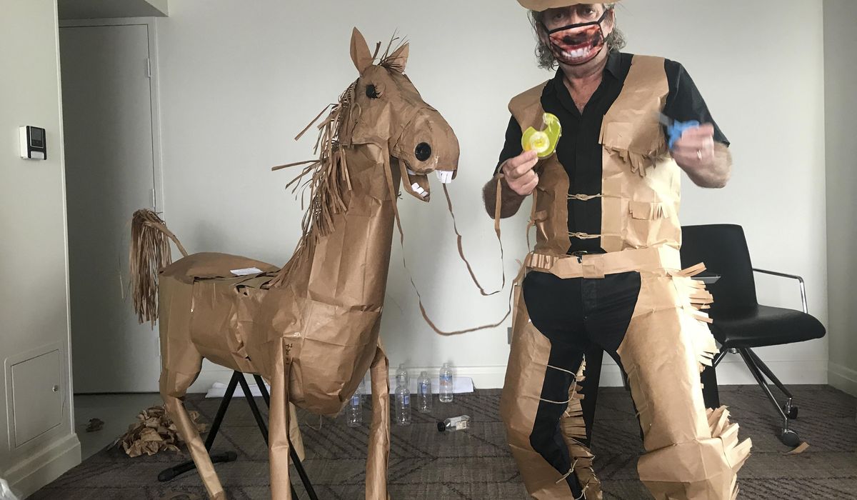 A paper cowboy rides out his quarantine in Australian
hotel 1