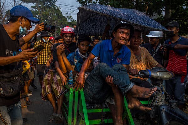 Myanmar Soldiers, Aiming to Silence Coup Protests, Target
Journalists 1