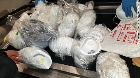 US Customs officials seize over 20 million counterfeit
masks 1