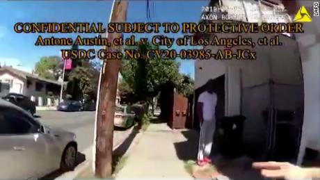 LAPD officers accused of racial profiling during arrest of
Black man outside his home 1